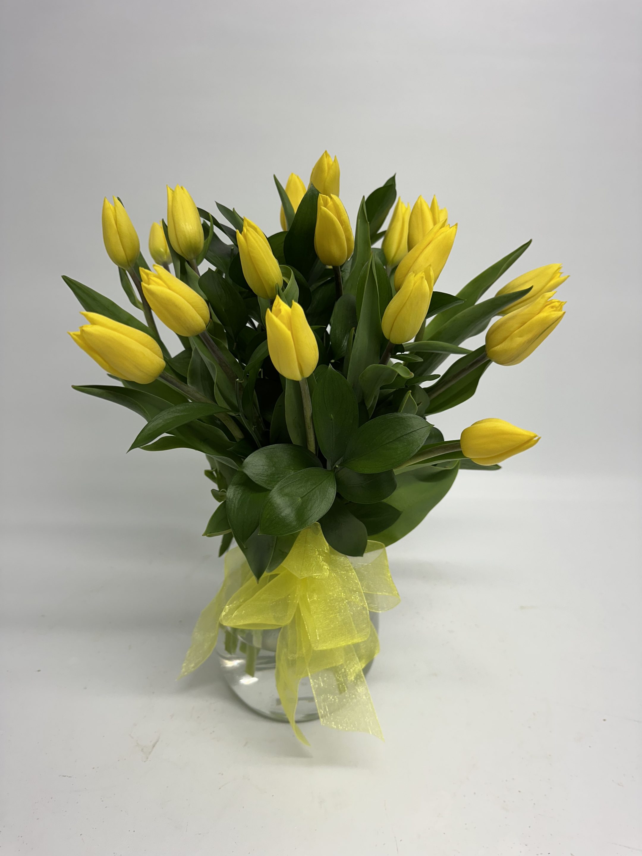 Yellow Tulips in Glass Vase