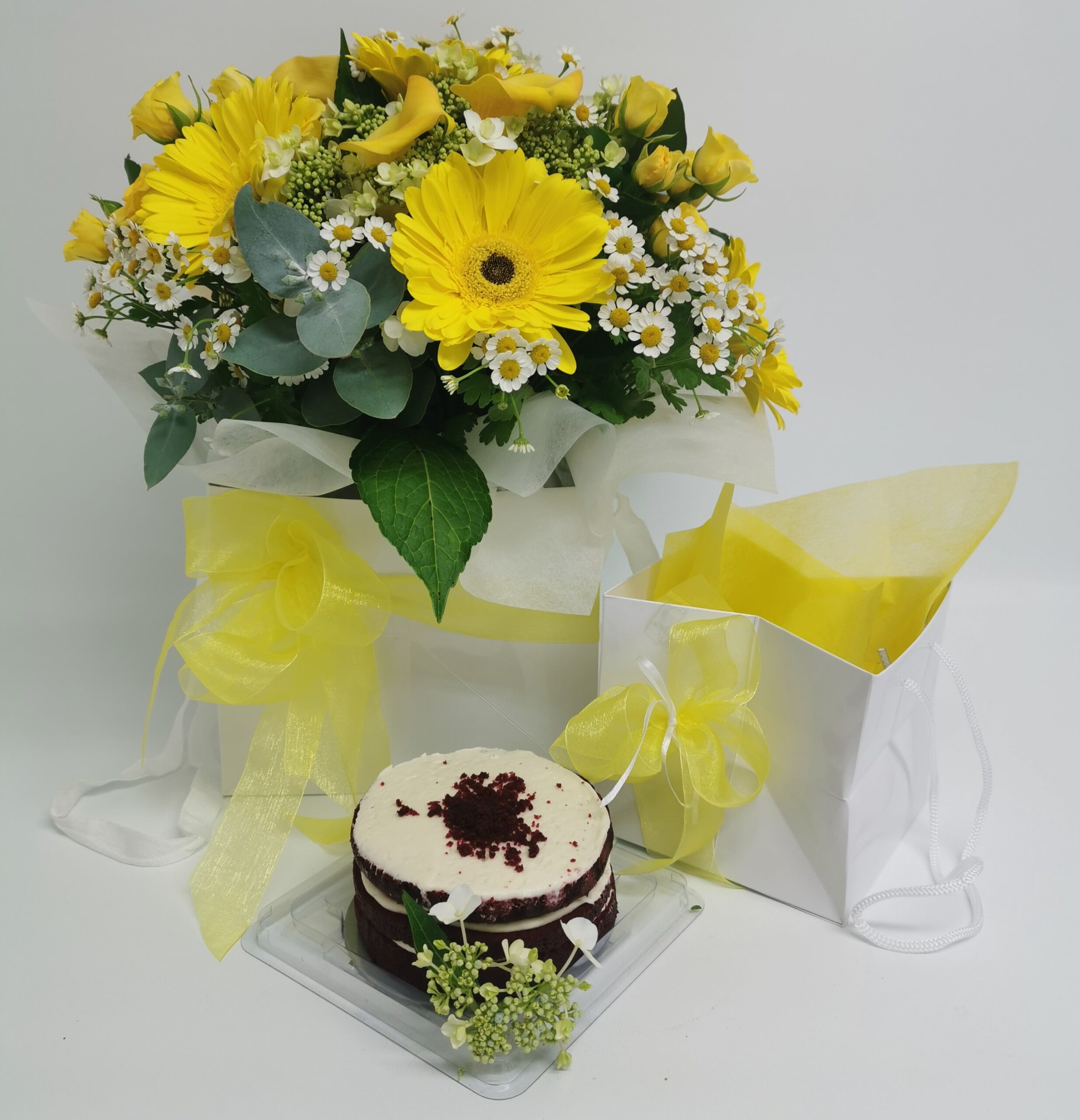 Yellow bouquet and velvet cake