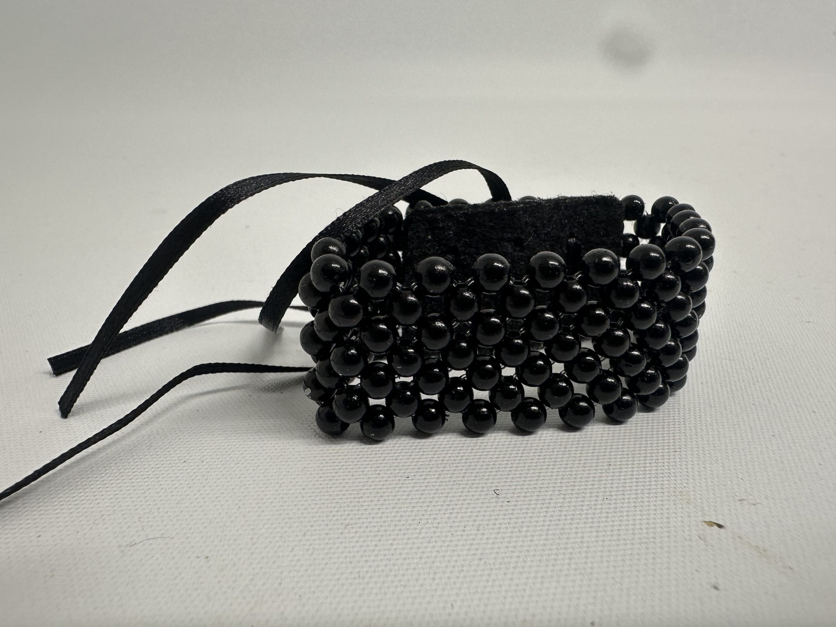 Black corsage band