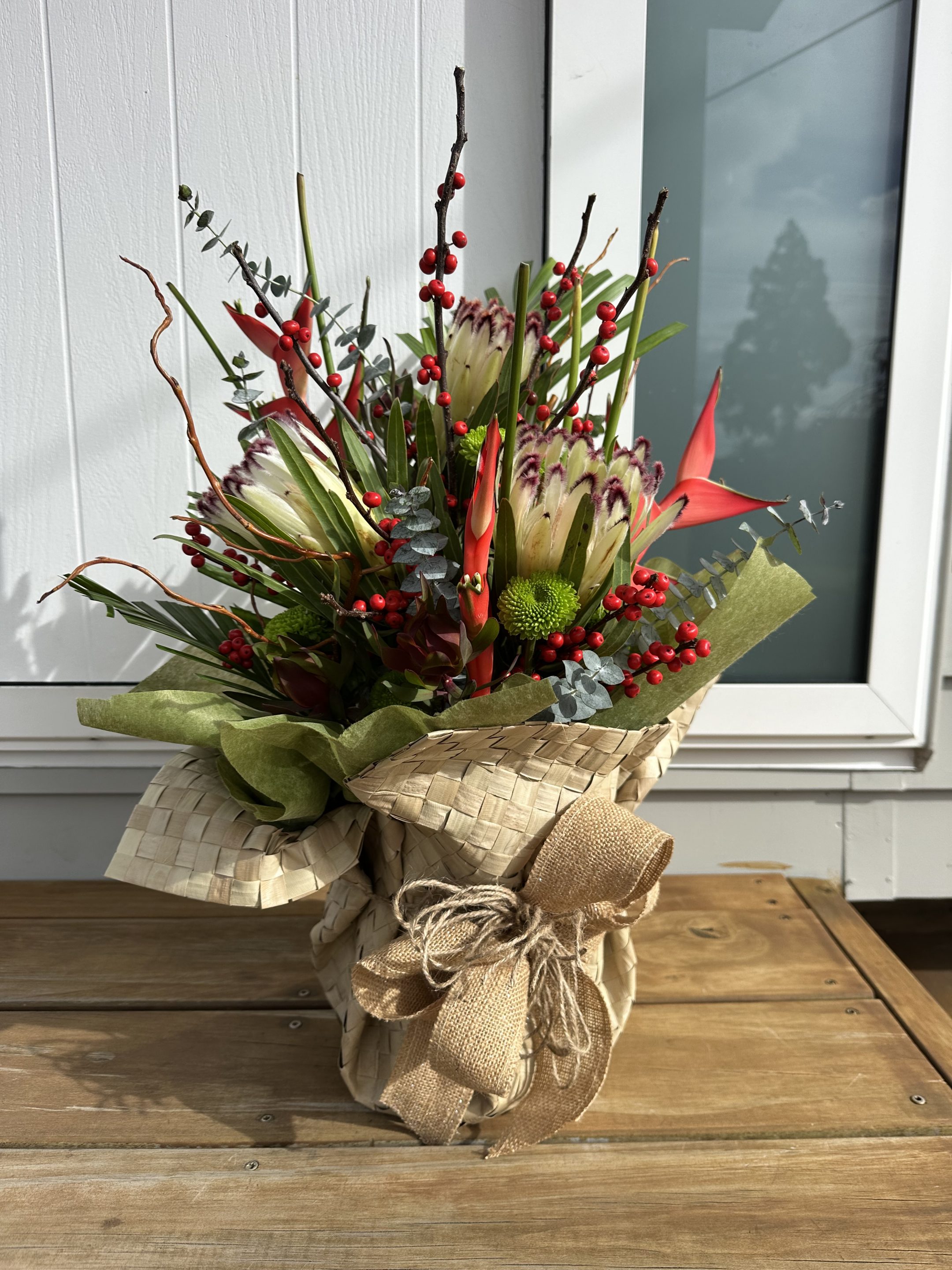 Protea Bouquet in kete wrap outside