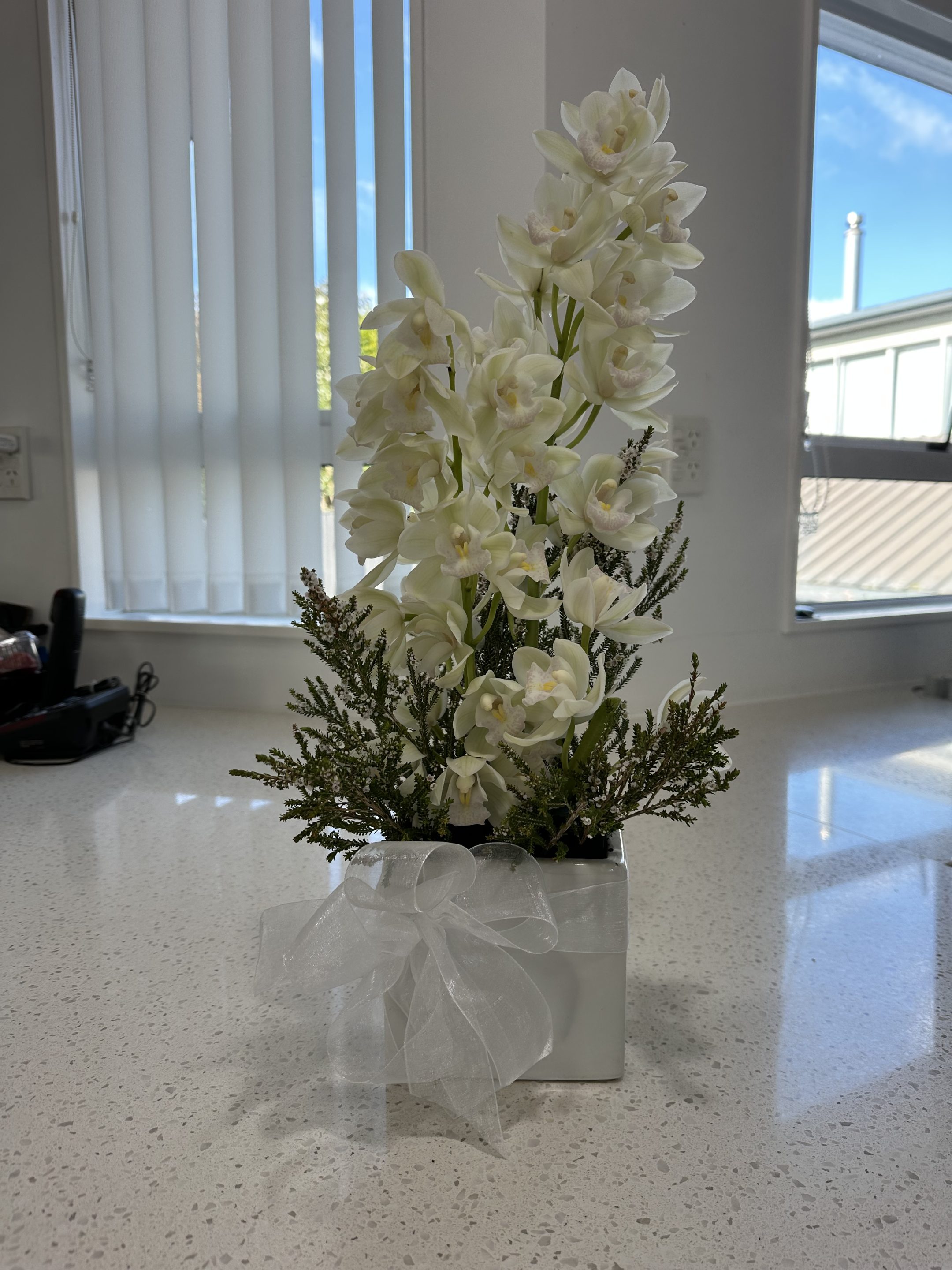white orchid cermic container