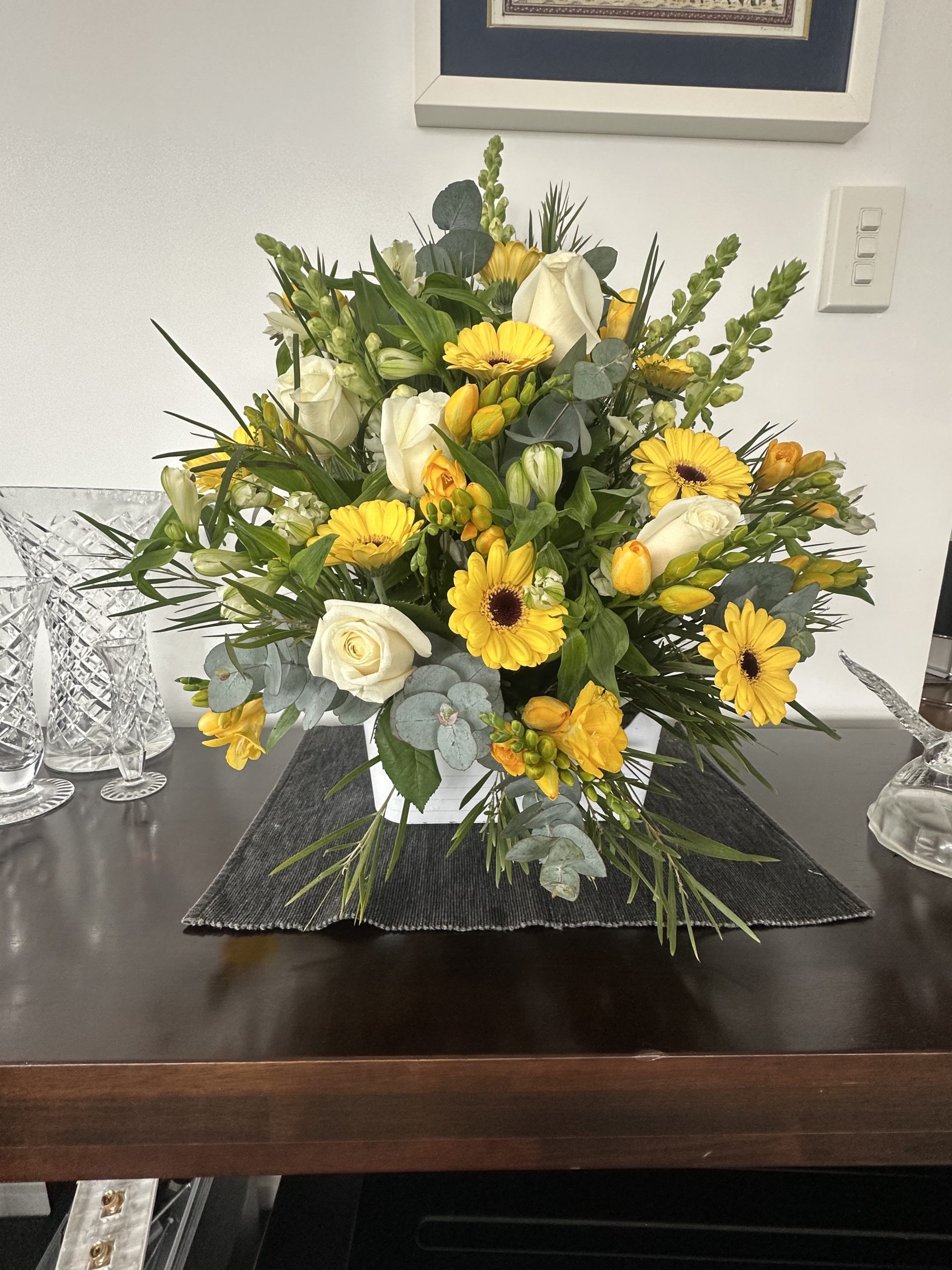 Yellow Trough arrangement on table