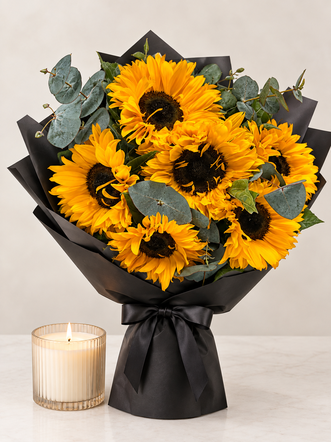 6 sunflowers and candle